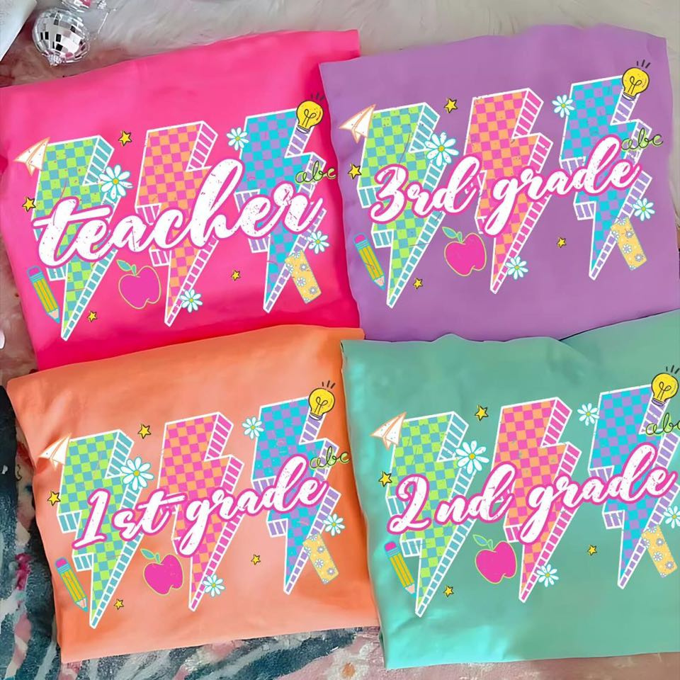 Cursive Grade with Green Pink and Blue Bolts