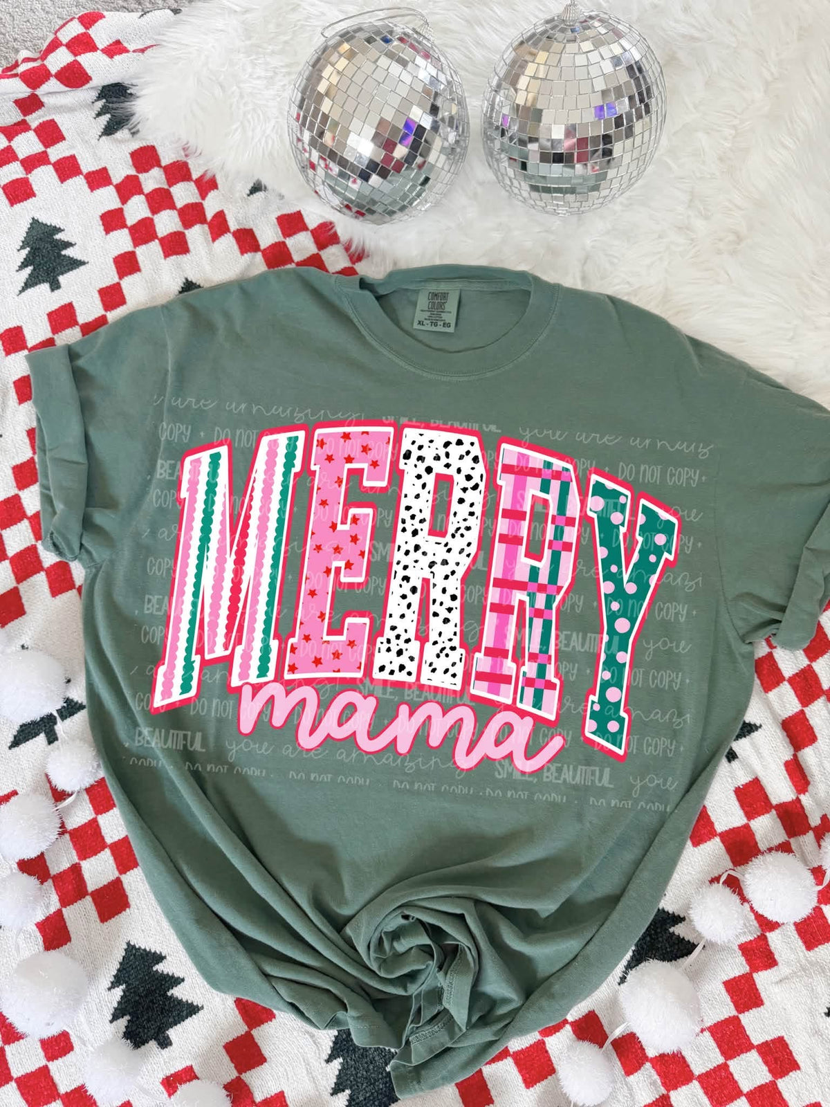 Merry Mama design on green tee