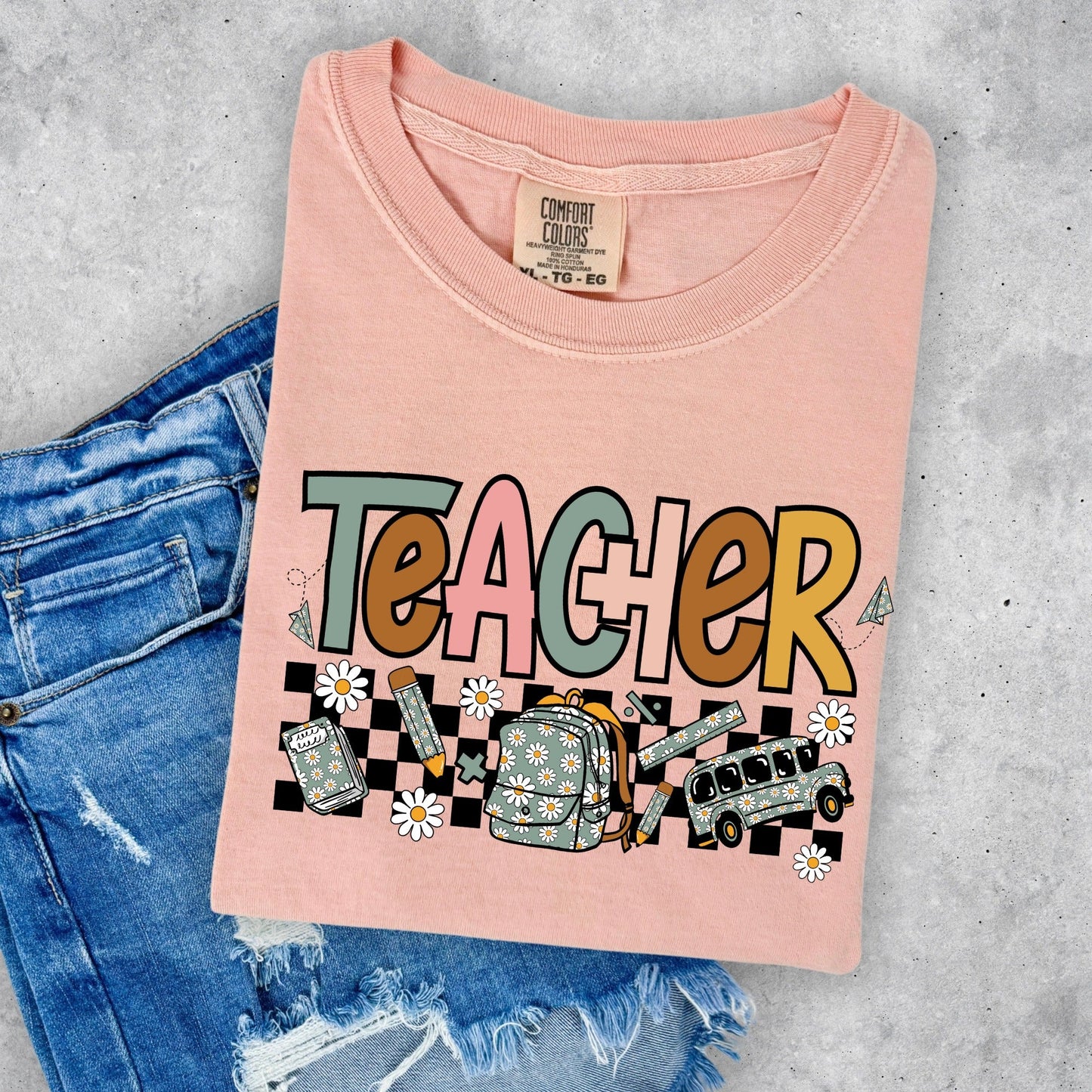 Teacher With Checkered Back Daisy and School Bus